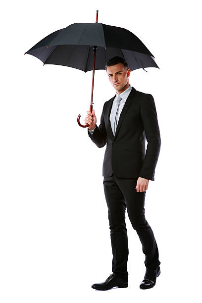 istock businessman holding umbrella 486018849