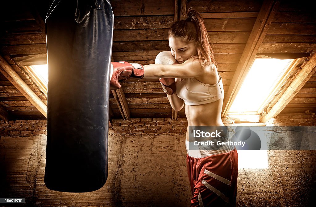 Young woman boxing workout on the attic Active Lifestyle Stock Photo