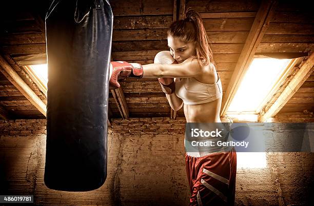 Young Woman Boxing Workout On The Attic Stock Photo - Download Image Now - Active Lifestyle, Activity, Adult
