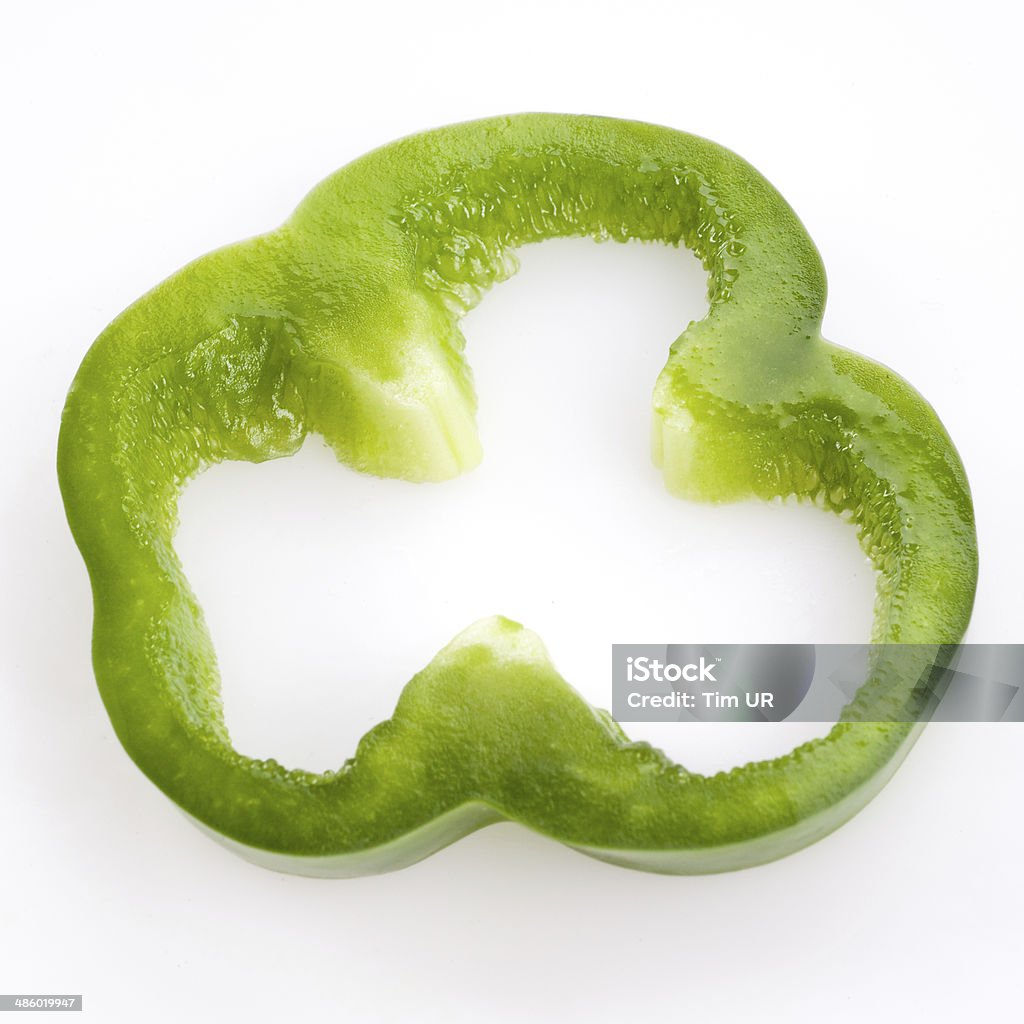 Sliced green pepper isolated on white Bell Pepper Stock Photo