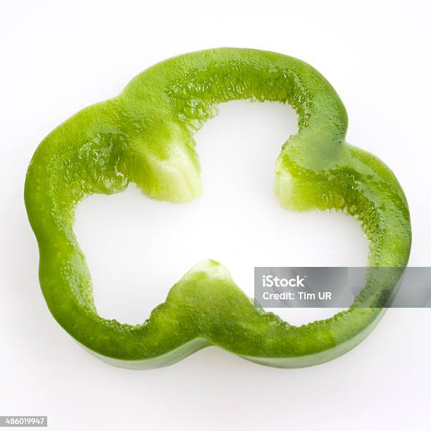 Sliced Green Pepper Isolated On White Stock Photo - Download Image Now - Bell Pepper, Bright, Chopped Food