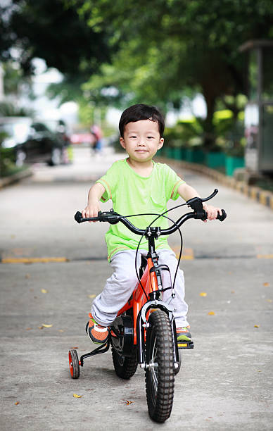istock Children ride a bike 486020157