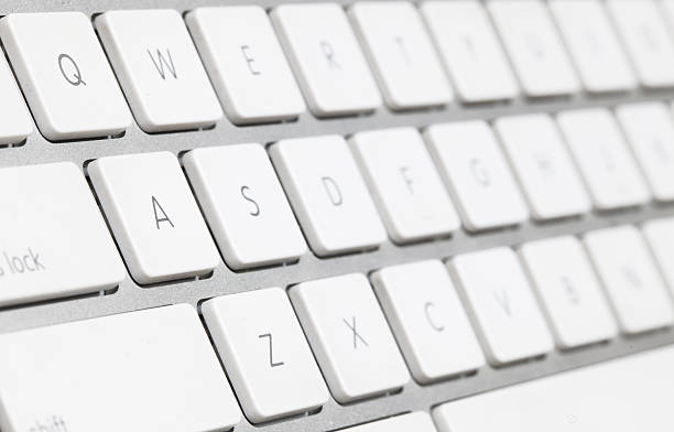 istock close up of a white keyboard english alphabet 486020657