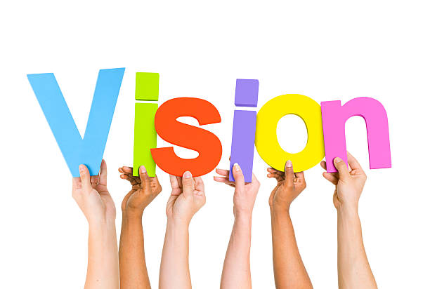 istock Multi-Ethnic Group of Diverse People Holding Letters Forming Vision 486021395