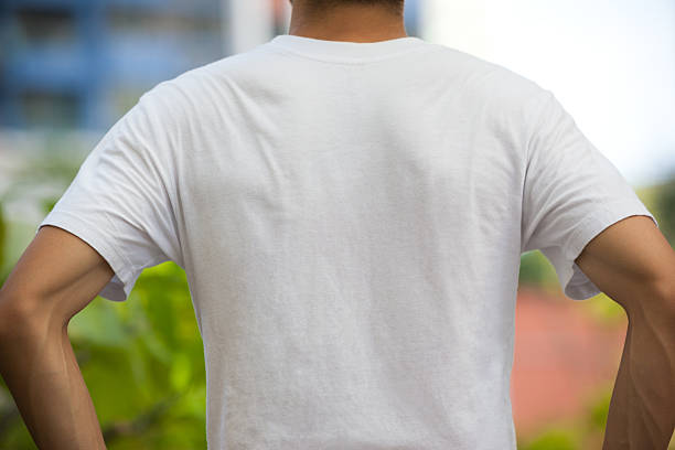 istock Back View of Blank White T-shirt on a Man 486022136