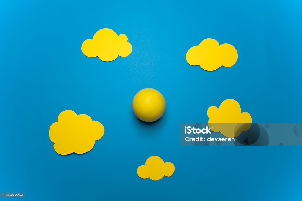 Cartoon Clouds Cartoon clouds on blue background with a smiley. Accessibility Stock Photo