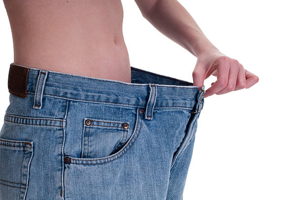 istock young girl with flat stomach 486022967