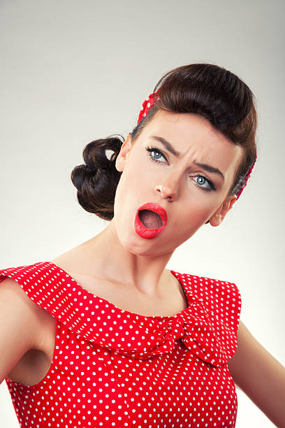 istock Angry retro young woman 486024095