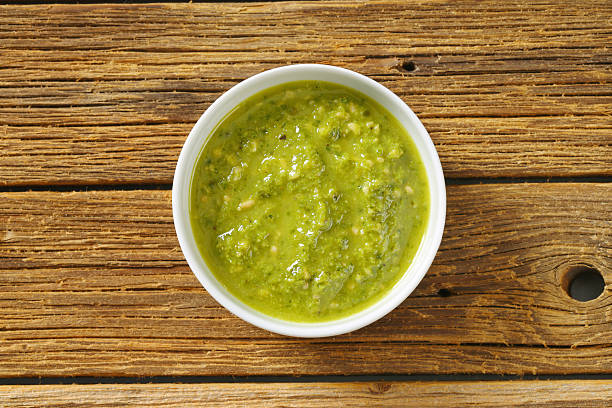 istock Green pesto sauce with fresh basil 486024117