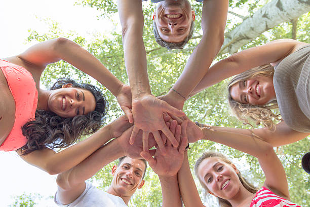 istock Group of Friends with hands in hands 486029562