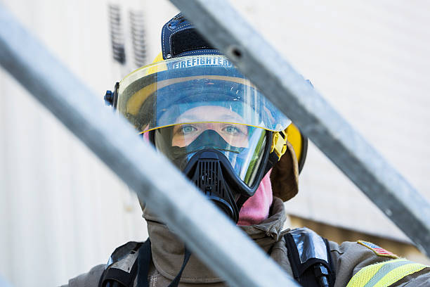 istock Face of a female firefighter in protective gear 486032904
