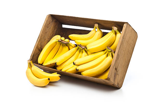 istock Bananas in a crate isolated on white background 486033294