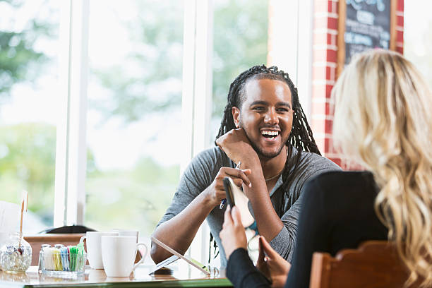 istock Multiracial couple in coffee shop talking 486033316