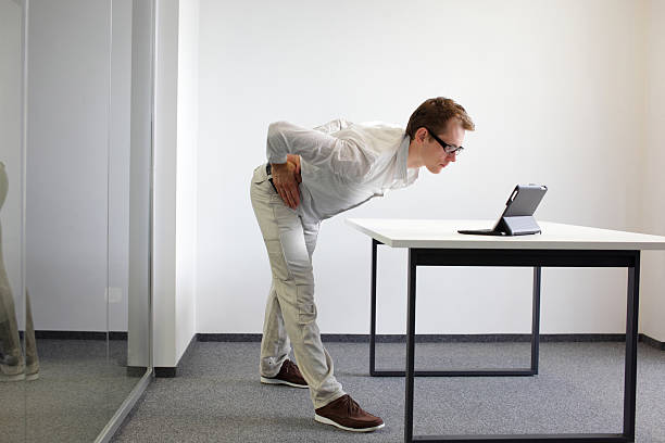 istock exercise durrng office work - man with tablet in his office 486034497