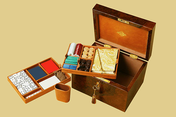 istock Wooden game box with casino chips. 486037733