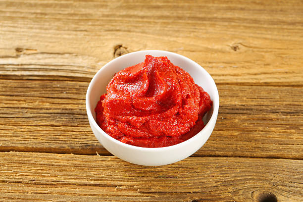 istock Tomato puree in a porcelain bowl 486038201