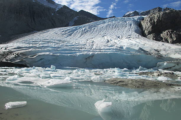 istock Reflection of a glacier on lake surface 486041542