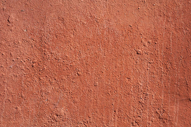 istock Texture of old wall covered with brown stucco 486047492
