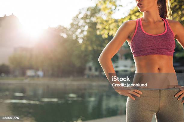 Young Woman In Sportswear With Fit Body Stock Photo - Download Image Now - Women, Exercising, One Woman Only