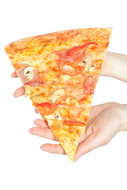 istock piece of a pizza in giving hands 486052483