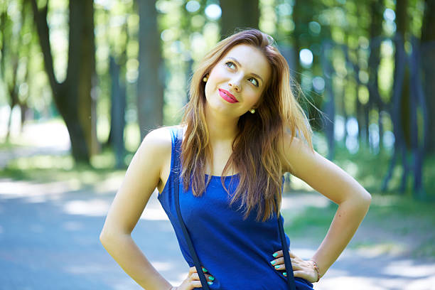 beautiful girl in a park smiling