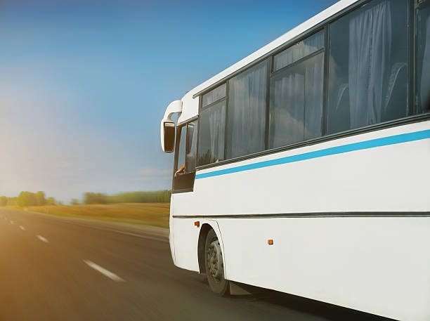 istock bus goes on  country highway 486054114