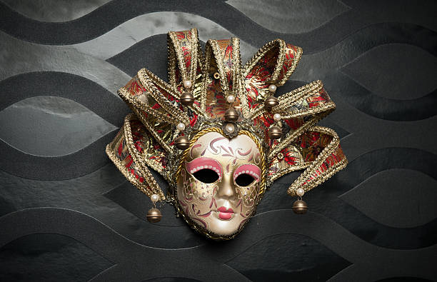 istock Beautiful classical mask from  Venice on black wall. Carnival mask 486054657