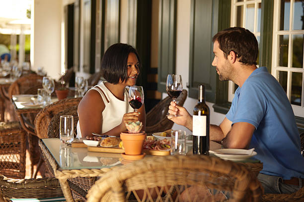 istock Couple having a red wine at restaurant 486059742