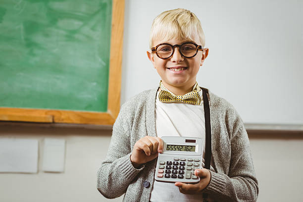 istock Pupil dressed up as teacher showing calculator 486059760