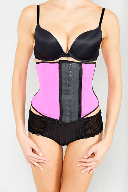 istock Woman in waist training corset 486063472