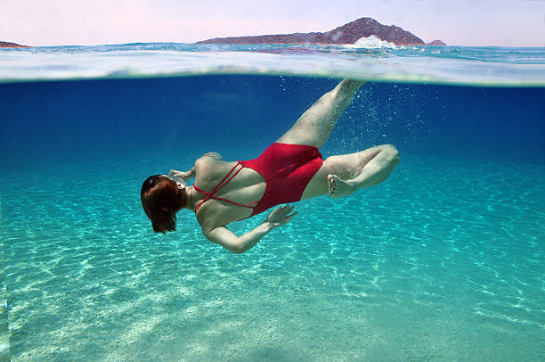 istock Girl and the sea 486069395