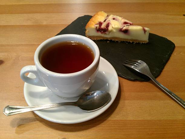 istock Cup of tea and cheese cake 486069587