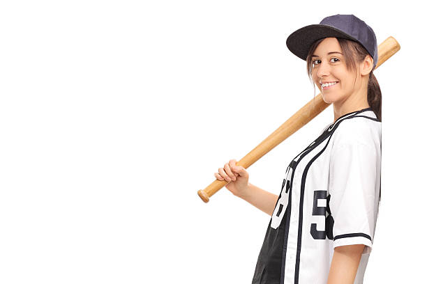 młoda kobieta trzyma kij baseballowy - baseball player baseball holding bat zdjęcia i obrazy z banku zdjęć