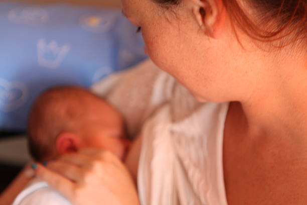 istock Mother mikling her baby 486071827