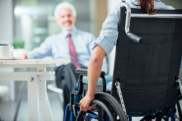 istock Disabled woman having a business meeting 486073102