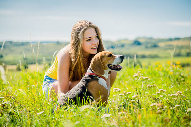istock Teenager with her dog 486073162