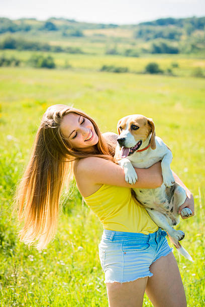 istock Young woman with her dog 486073704