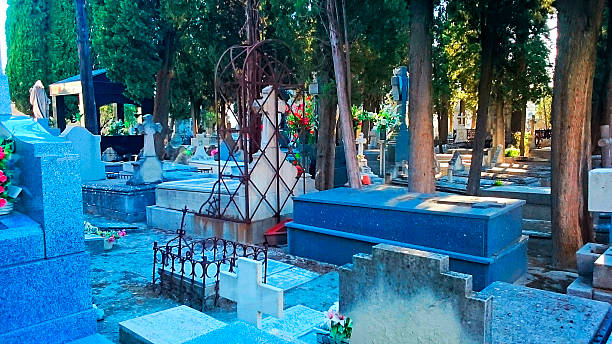 istock Graves and tombstones in the morning July 486073748