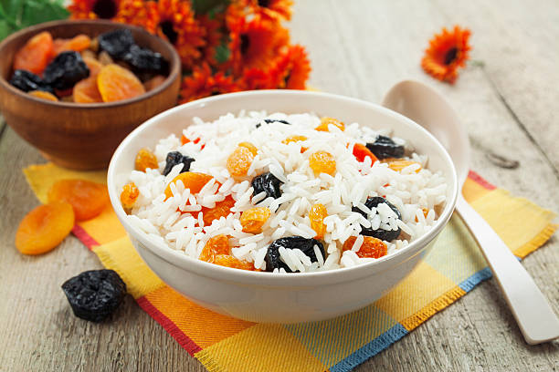 arroz com frutas secas - rice food processed grains bowl - fotografias e filmes do acervo