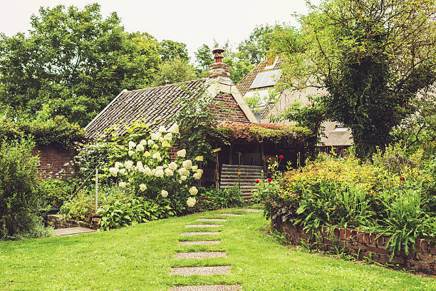 istock Private Garden with Pathway and Small House. 486077450