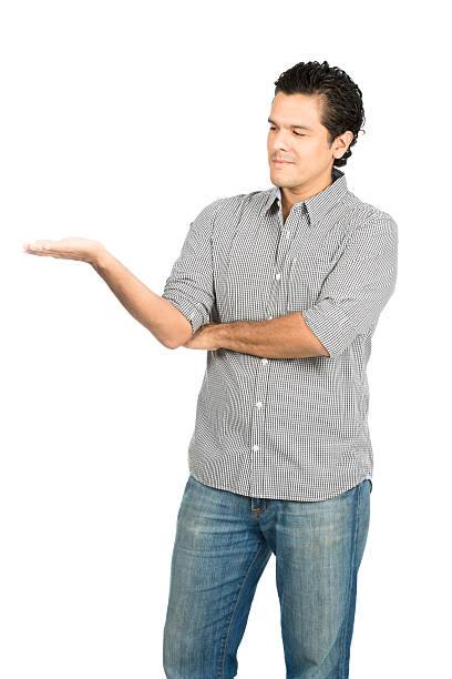 istock Looking At Hand Latino Man Displaying Product V 486078868