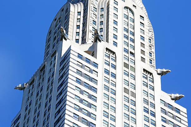 Gargoyles of Chrysler Building in New York New York, USA - August 10, 2015: Detail of Gargoyles mounted on corners of Chrysler Building in Manhattan chrysler building eagles stock pictures, royalty-free photos & images
