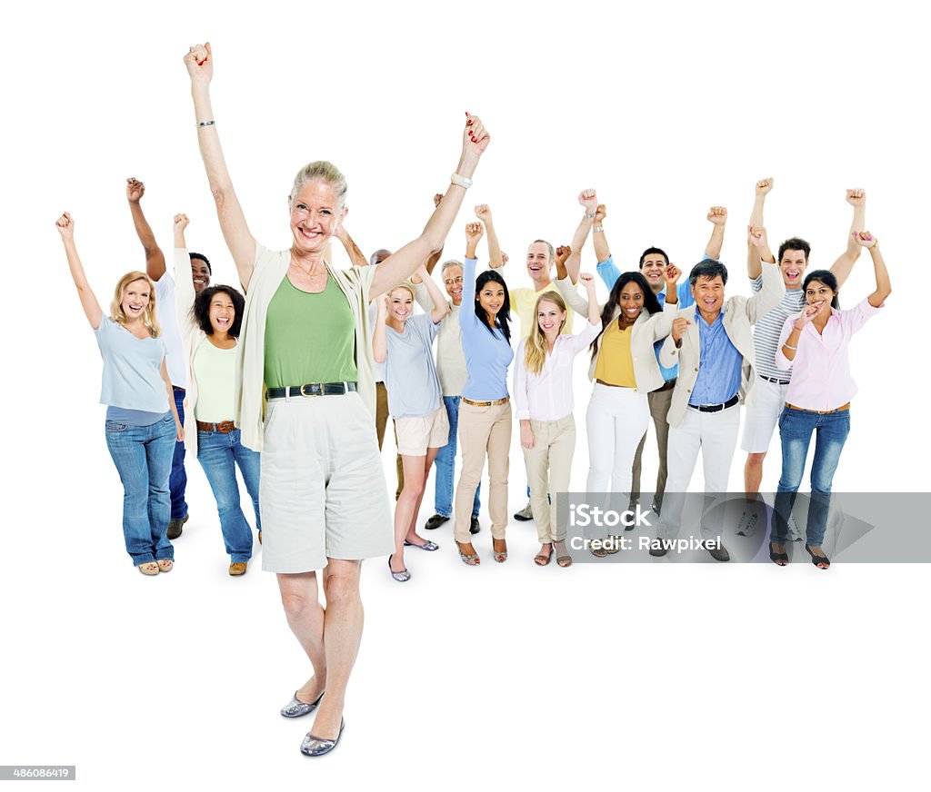 Group of Diverse Multi Ethnic Cheerful People Celebrating Group of Diverse Multi Ethnic Cheerful People Celebrating with their Arms Outstreched Cheering Stock Photo