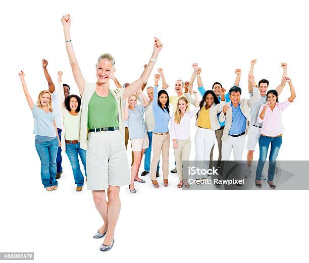 Group Of Diverse Multi Ethnic Cheerful People Celebrating Stock Photo - Download Image Now