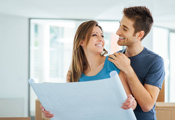 istock Young couple planning their new house 486090008