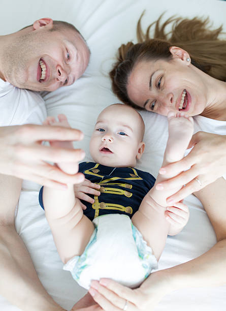 istock Happy parents and child 486090142