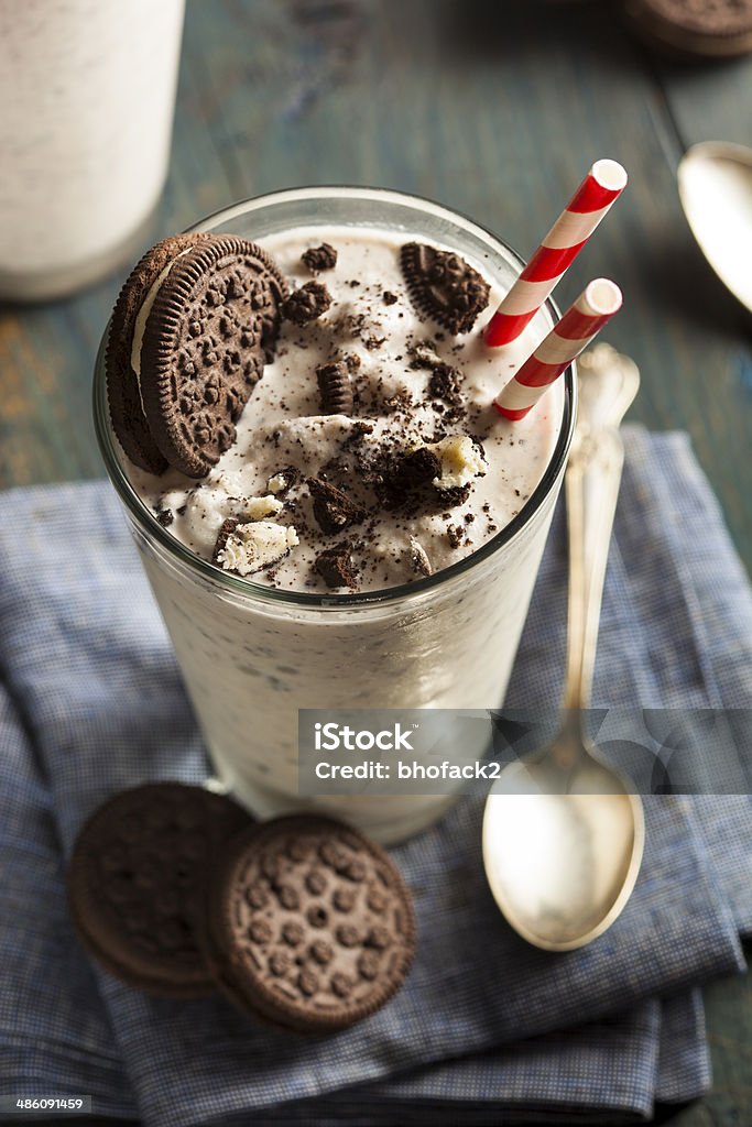 Homemade Cookies and Cream Milkshake in a Glass Homemade Cookies and Cream Milkshake in a tall Glass Cookie Stock Photo