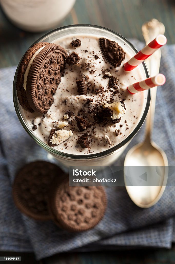 Cookies and Cream Milkshake Homemade Cookies and Cream Milkshake in a Tall Glass Cookie Stock Photo