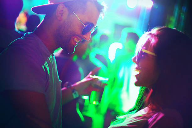 istock Couple having fun at a concert. 486094944