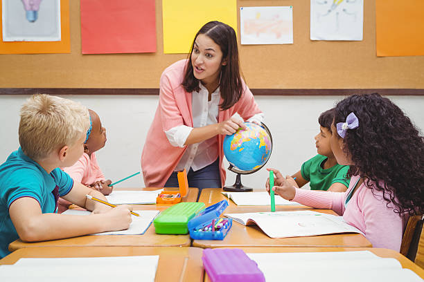 istock Students listening to the teacher 486095056